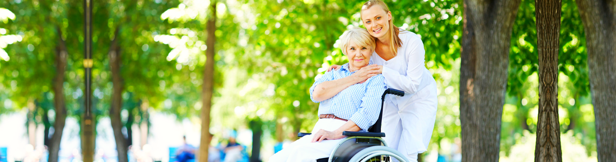 a lady and an old woman in the park